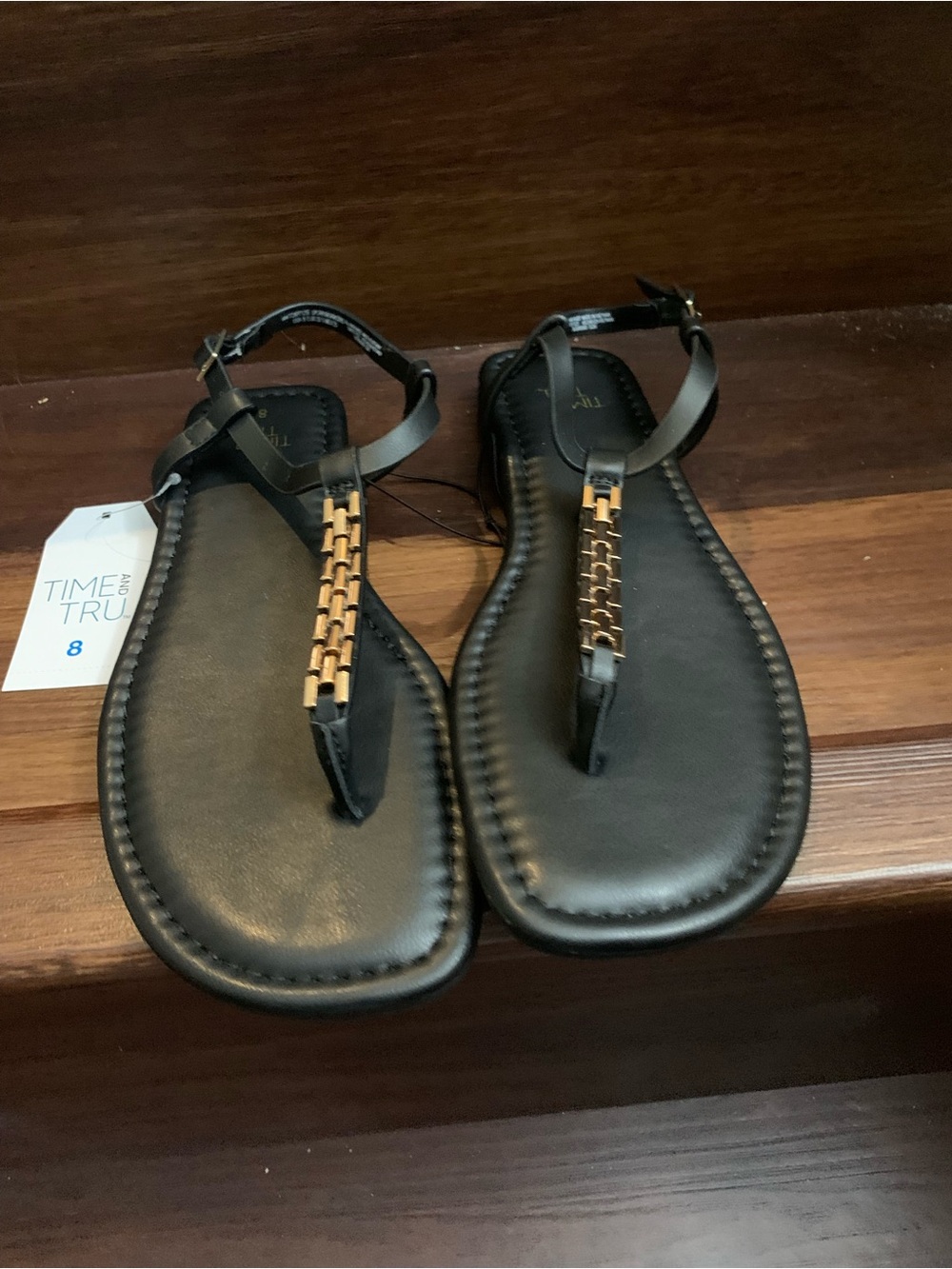 New Woman’s Time and Tru Black T-Strap Sandals with Gold Chain Accent. Size 8